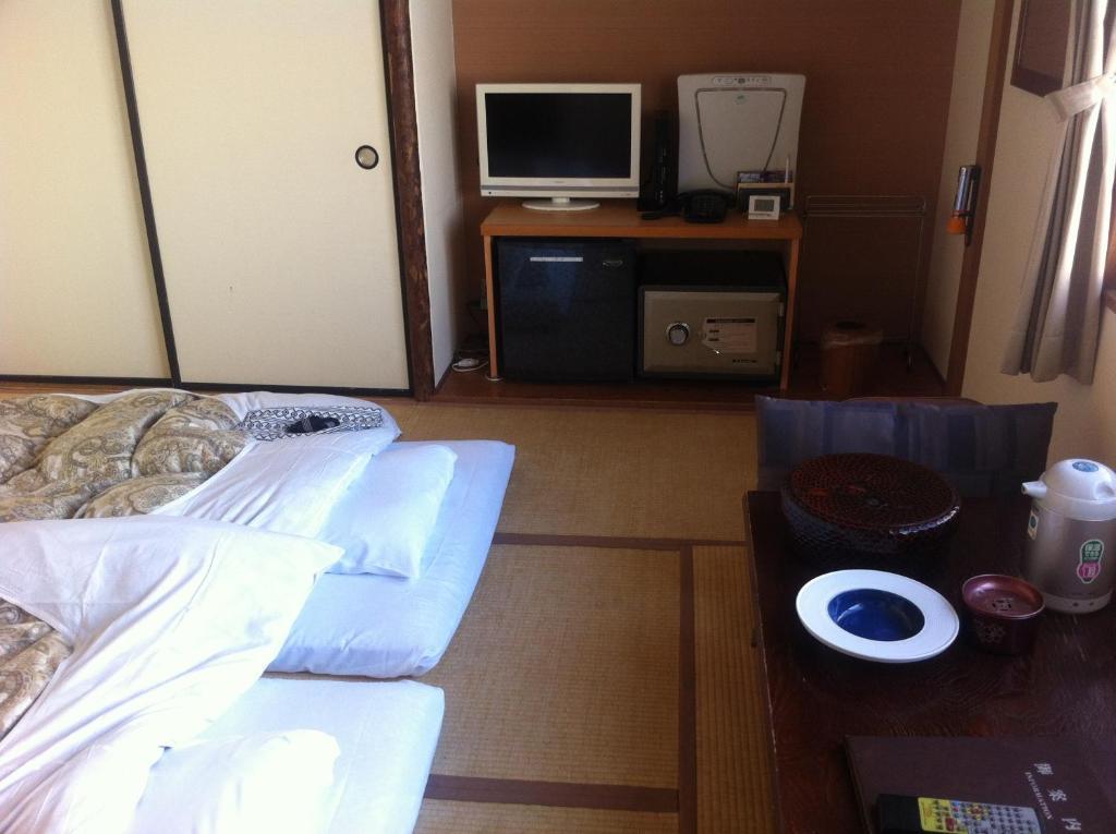 Hotel Kikuya Hakodate Rum bild